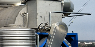 水泥厂的粉尘该选用哪种工业除尘设备？